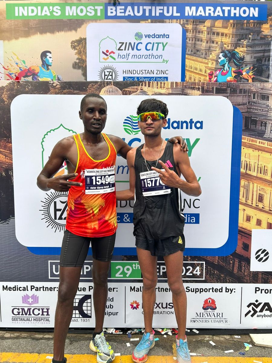 21 km male category first position Rohit Bansiwal with runner-up Kenyan athlete Victor Kurgut